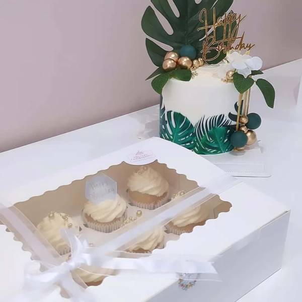 Création d'un gâteau et gourmandises sur le thème feuilles tropicales et doré à Vert Saint-Denis (77)